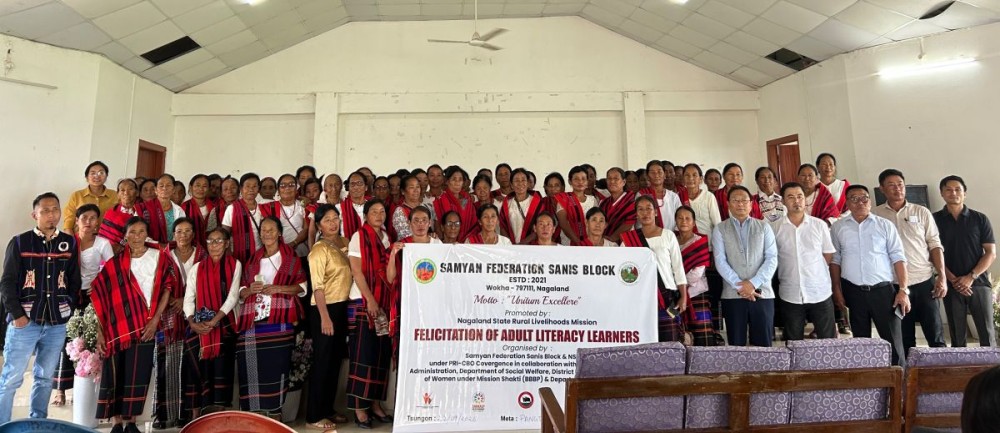 Wokha DC K Mhathung Tsanglao, along with organisers and participants, during the felicitation programme for 66 adult learners who completed the three-month Adult Literacy Campaign at Pangti Community Hall, Sanis Block, on September 22. (Morung Photo)